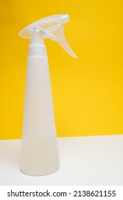 White Plastic Pulverizer On A Yellow Background