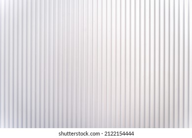 White plastic surface texture with vertical lines