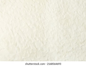 White plasticine texture with finger prints. Modeling clay material pattern background.