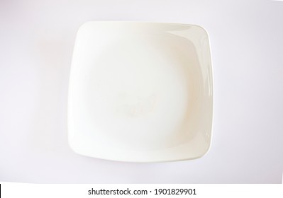A white plate isolated on a white background