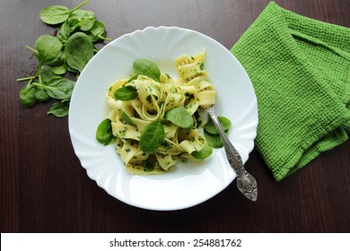 White Plate With Tagliatelle Pasta With Fresh Spinach