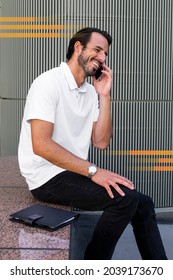 White Polo Shirt Man Talking On The Phone Menswear Apparel Fashion