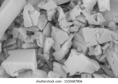 White Polyurethane Foam Rubber Pieces Background Texture. Stuffing For Pillows And Furniture