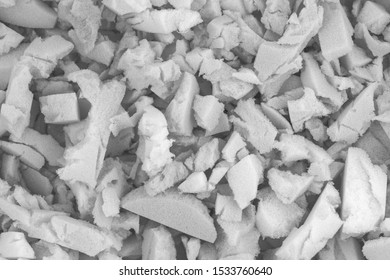 White Polyurethane Foam Rubber Pieces Background Texture. Stuffing For Pillows And Furniture