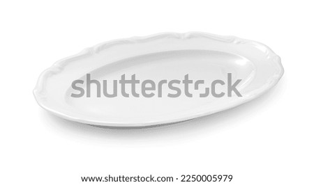 White porcelain plate isolated. Oval plate on white.