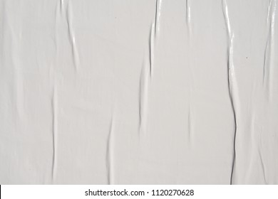 a white poster glued with wheat paste - Shutterstock ID 1120270628