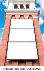 white poster on Clock tower