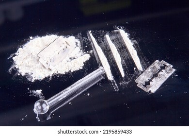 White Powder Drugs With Razor And Smoking Pipe. Drug Use Concept.