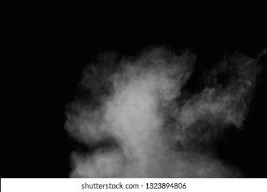 White powder explosion cloud against black background.White dust particles splash. - Shutterstock ID 1323894806