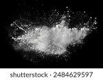 White powder explosion on black background. Colored cloud. Colorful dust explode. Paint Holi.