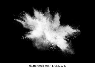 White Powder Explosion On Black Background. 