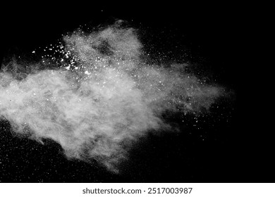 White powder explosion on black background. Colored cloud. Colorful dust explode. Paint Holi.