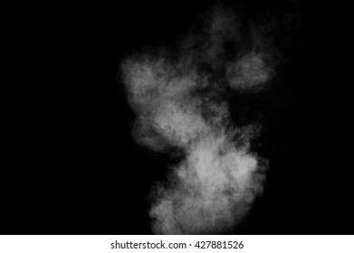 White powder explosion on black background. Abstract white dust texture. - Shutterstock ID 427881526