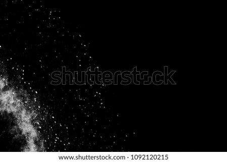   White Powder explosion on black background. White dust exploding.