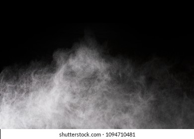 White powder isolated on black background. - Shutterstock ID 1094710481