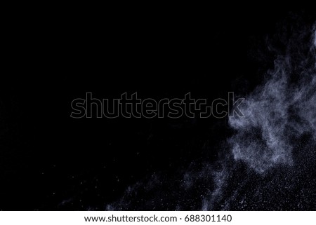 White powder on black background



