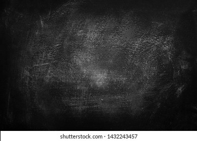 white powder on black chalkboard background for texture.
