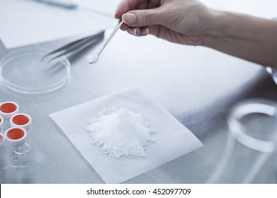 White Powder On Top Of The Paper.