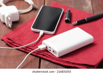 White Power Bank Charging Smart Phone