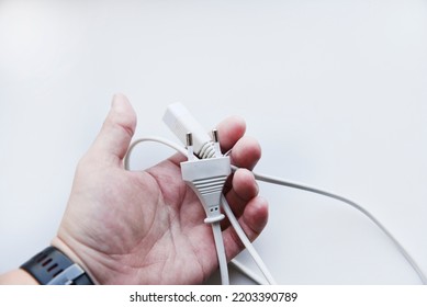 White Power Cord On A White Background. Electric Cord On A White Background.