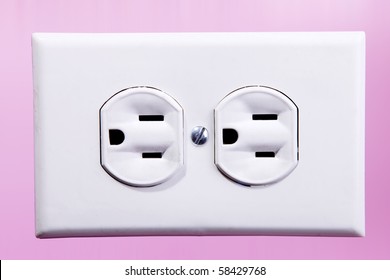 White Power Plug In A Pink Wall