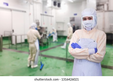 White Protective Uniform With Mask And Gloves. Quality Control Worker Jobs Washer In Food Industrial Process, Cleaning Floor In Food Plant, Young Female Supervisor.