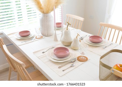 White And Purple Plate Setting On Dinning Table At Home.