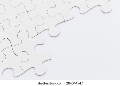 White Puzzle On The Table