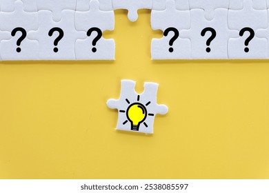 White Puzzle with Question Mark and Missing Piece Light Bulb Icon idea for Creative Problem Solving,Innovation and Strategy,Education.