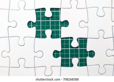 White puzzle with some missing puzzles. copy space concept.