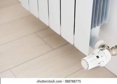 White radiator in an apartment. Radiator. - Shutterstock ID 388788775