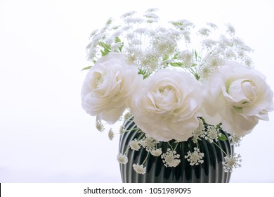 White Ranunculus And Laceflower