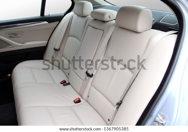 white rear seat of a
luxury passenger car