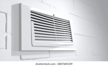 A white rectangular air vent with horizontal slats is mounted on a textured white brick wall