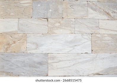 White rectangular marble stone wall texture, natural masonry background, marble tile surface, limestone cladding, decorative stone wall, horizontal stone blocks, rough stone surface, building facade.