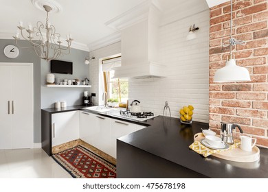 White And Red Brick In Little Trendy Kitchen