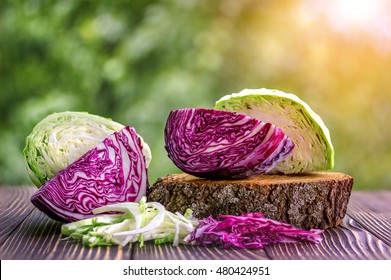  White And Red Cabbage And  Chopped White And Red Cabbage On Wooden Background