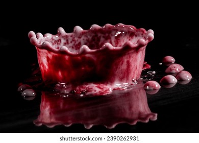 white and red dropp with reflection