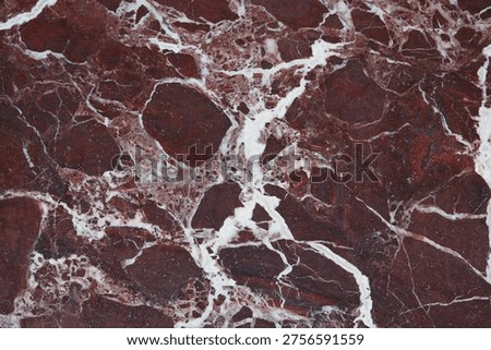 White and red patterned marble in nature