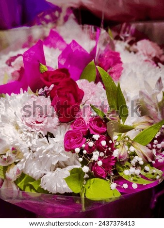 White, red and pink flower bouquet represents eternal love with passion for a cute and lovely person; with a lot of respect and honour.