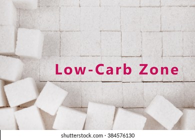 White Refined Sugar Background And Text Low-Carb Zone On It