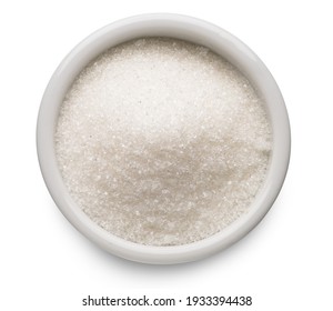 White refined sugar in ceramic bowl on white background. Top view. File contains clipping path. 