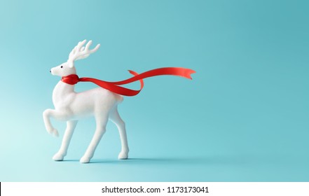 White reindeer with red scarf on pastel blue background. Christmas or New Year minimal concept. - Powered by Shutterstock