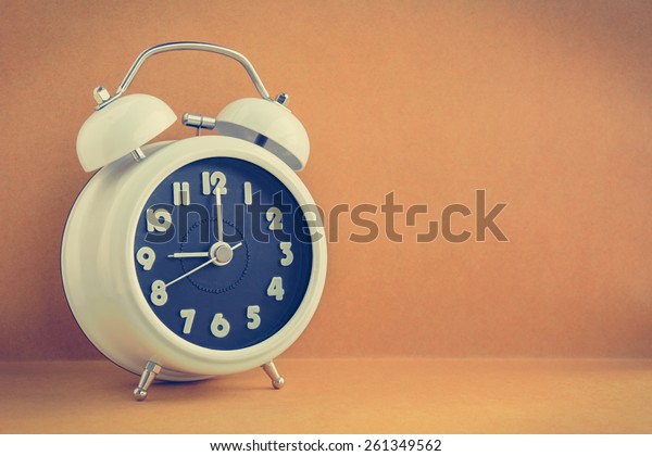 White Retro Alarm Clock On Light Stock Photo Edit Now 261349562