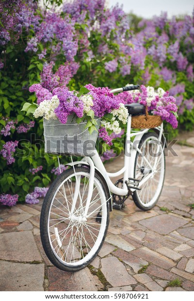 flowers in bicycle basket