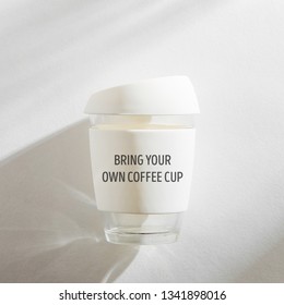 White Reusable Eco Coffee Cup On White Morning Background. 