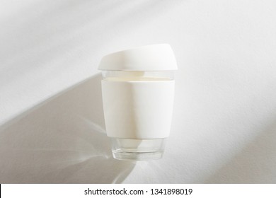 White Reusable Eco Coffee Cup On White Morning Background. 