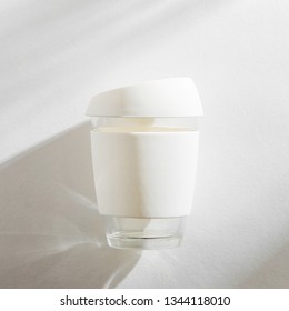 White Reusable Eco Coffee Cup On White Morning Background. 