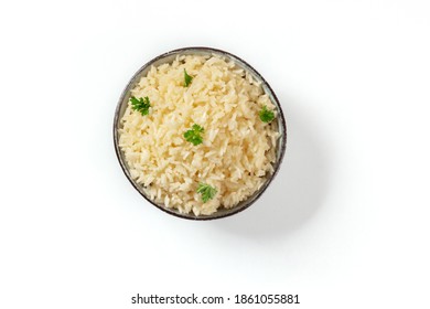 White Rice, Overhead Shot On A White Background. With Fresh Parsley Leaves