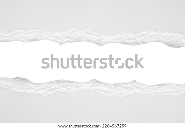 White ripped paper torn edges strips isolated\
on white background